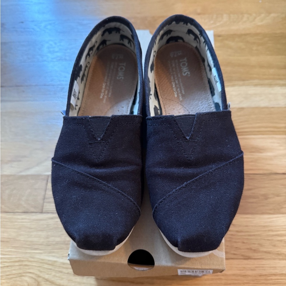 TOMS Black Canvas Slip-Ons